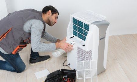 Dehumidifier being installed in a basement