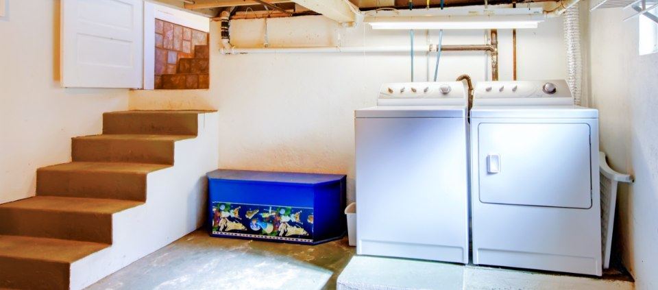 A dehumidifier installed in a basement