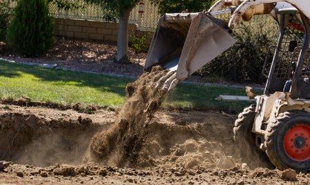 A landscape grading project. Showing grading equipment.