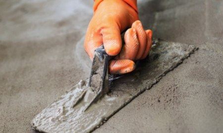 A repaired concrete slab with a smooth and even surface.